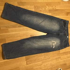 Svin baggy Evisu jeans 38 x 33  dom är i vintage skick 