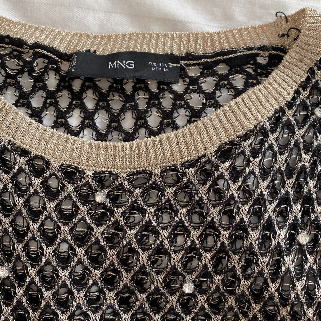 Glittrig väst från mango - 90