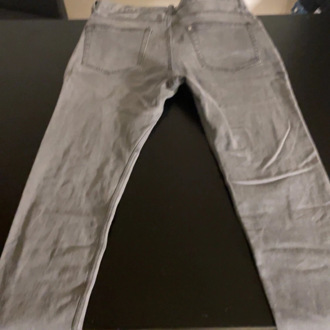 Grå jeans från H&M - 90
