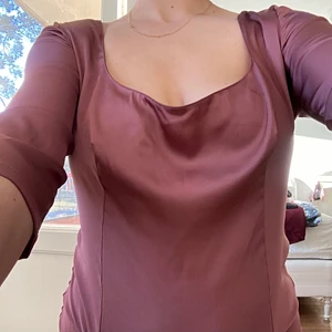 Satin bodysuit L - Jättefin bodysuit från Oysho. Använd en gång. Storlek L.