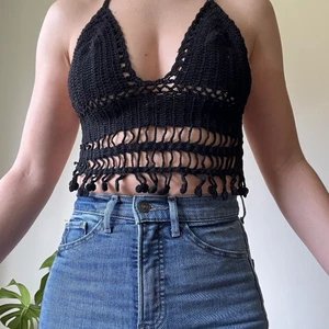 Black Croschet Bikini Top SMALL - Black croschet bikini top. Bought it in Thailand a few years ago but, never wore it. It is in good condition. Perfect to wear with jean shorts or linen pants 🥰 open back just a strip to tie it.