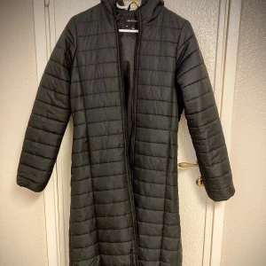 Tunn täckkappa - Fin lång täckkappa.