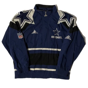 vintage nfl cowboys blue insulated windbreaker  - -vintage nfl cowboys blue insulated windbreaker   -size: large  -small black ink stains throughout, pictures available  