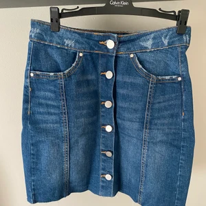 Jeanskjol - Kjol från Gina. Aldrig använd. Nypris 400kr mitt pris 50kr
