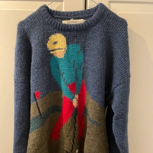 Stickad tröja med golfare på - Ylletröja i fint skick! Köpt för ca 400kr. Köparen står för eventuell frakt