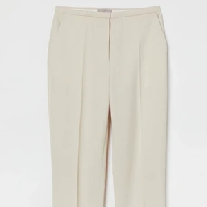 Kostymbyxor  - Beige kostymbyxor från H&M i storlek 34 