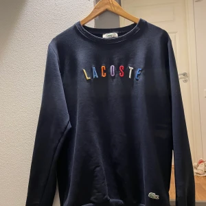 Lacoste sweatshirt strlk M/L - Inga fel på den.