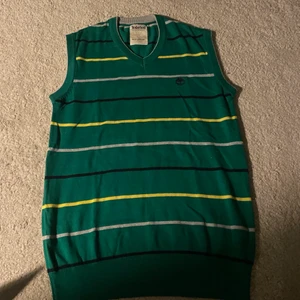 Striped vesttop  - Such a cute green and striped vest top! A thrifted find i adore but dont use a lot. 