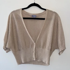 MAGTRÖJA - Jättesöt guldglittrig croptop, storlek M. 