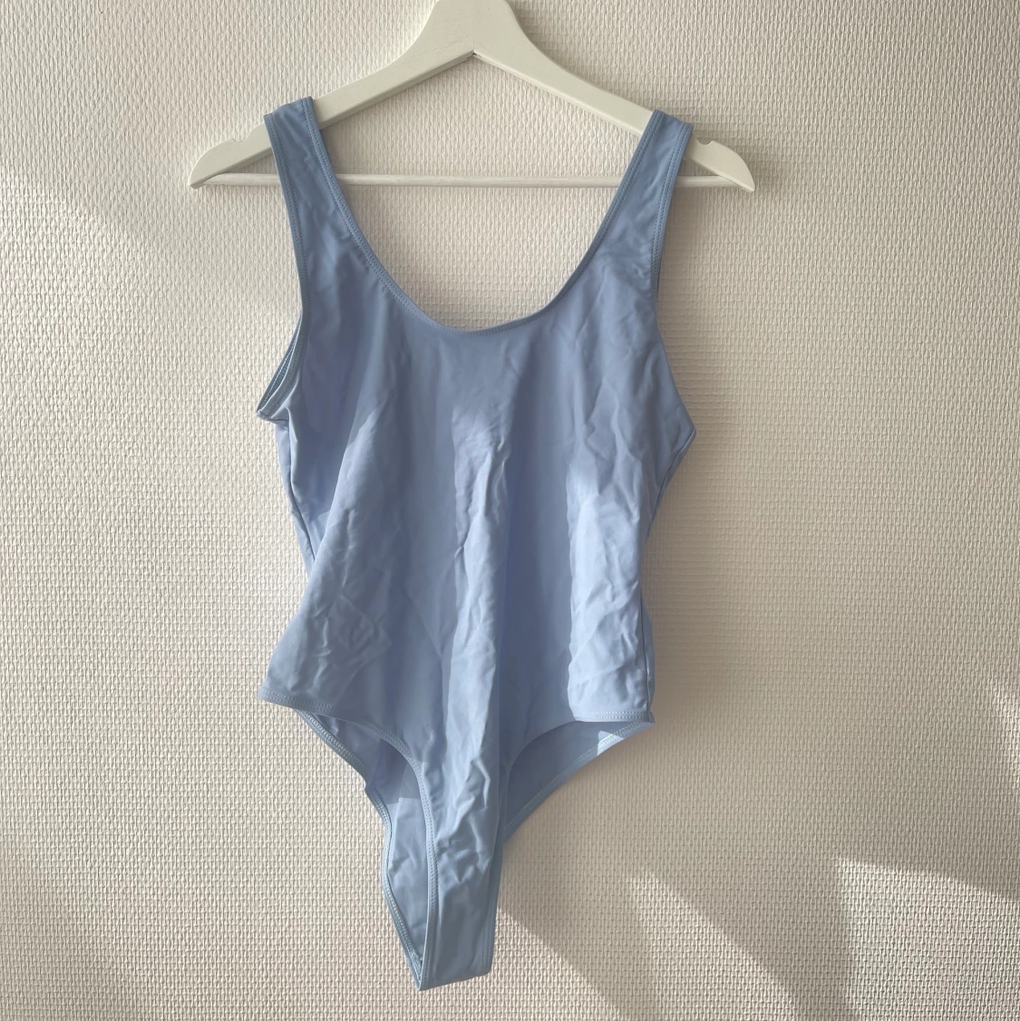 Himmelsblå baddräkt st M