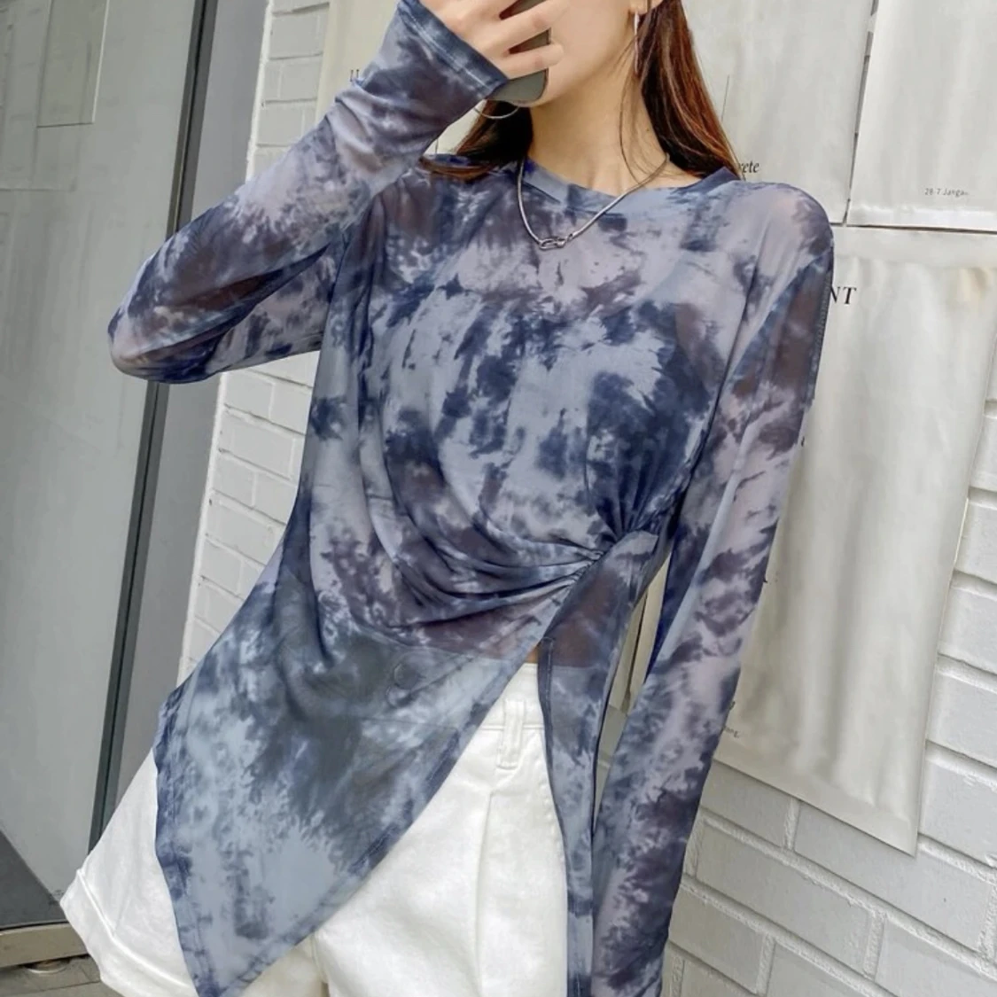 Genomskinlig blåa topp