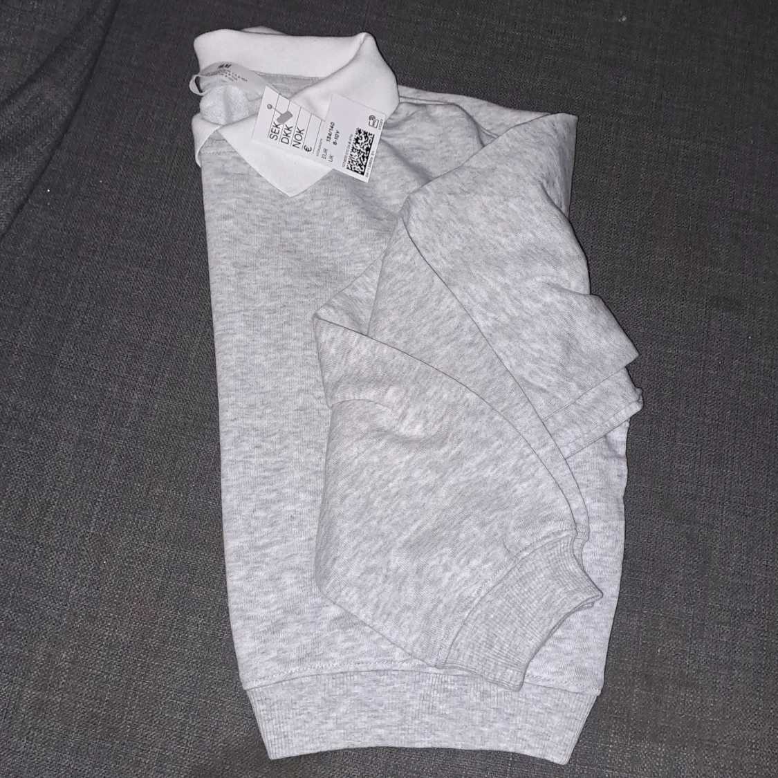 Ny skjorttröja, lappen kvar. 