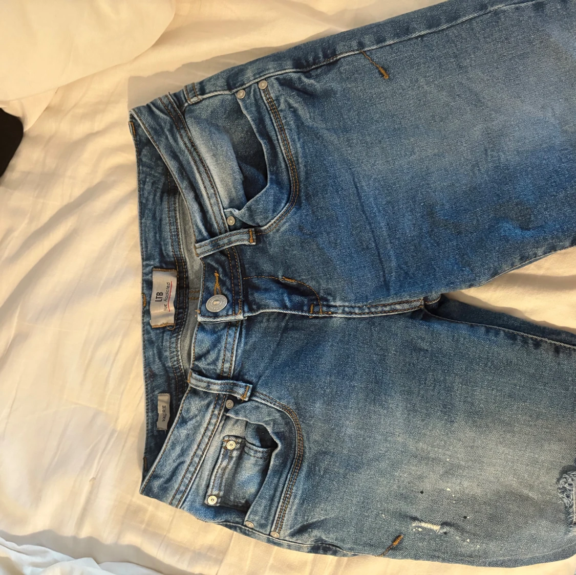 Blå slitna jeans från LTB W26 L30 - 1