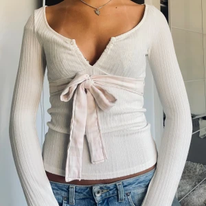 Babydoll topp med rosa knytband - Söt topp med rosa knytband som jag sytt på själv