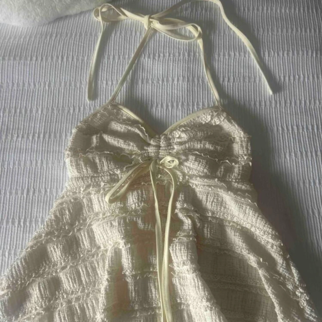 Vit volangig linnetopp  - 2