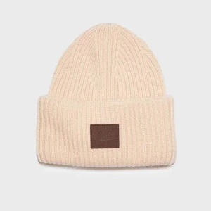 Acne mössa - Säljer denna acne mössa då den inte kommer till användning. Använt sparsamt. Nypris 2199 säljer för 1200 kr