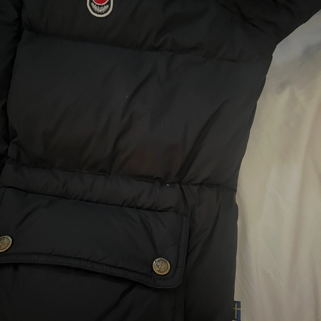 Svart pufferjacka från Fjällräven L - 3