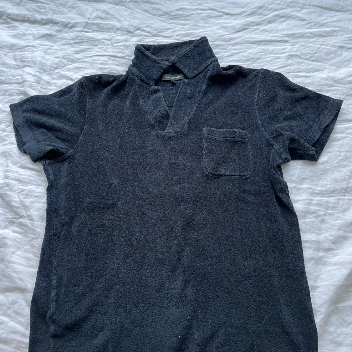 Mörkblå frotté pikétröja