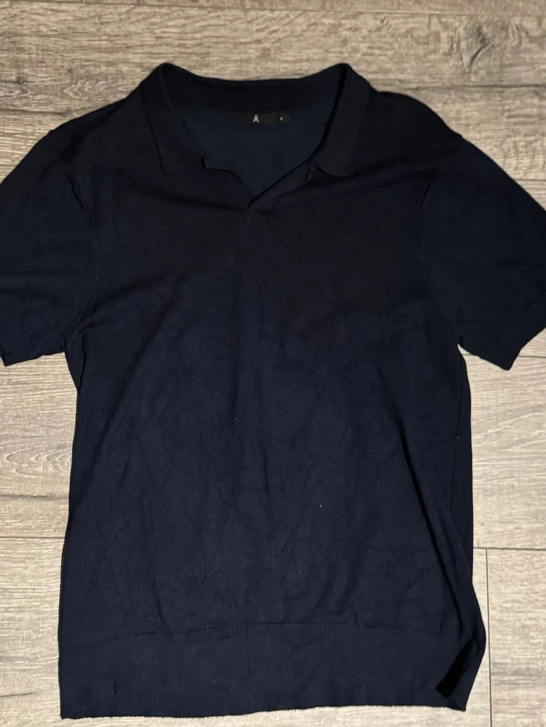 Mörkblå piké t-shirt från Åhléns 