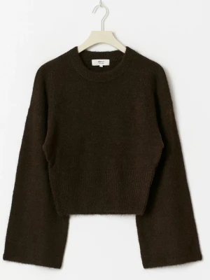 Mörkbrun stickad tröja - Mysig mörkbrun stickad tröja från Ginatricot med vida ärmar. I väldigt fint skick och sååå snygg. Perfekt brun färg och jättefin passform.💕 skickar med gratis produkter vid snabb affär🥰skriv vid frågor