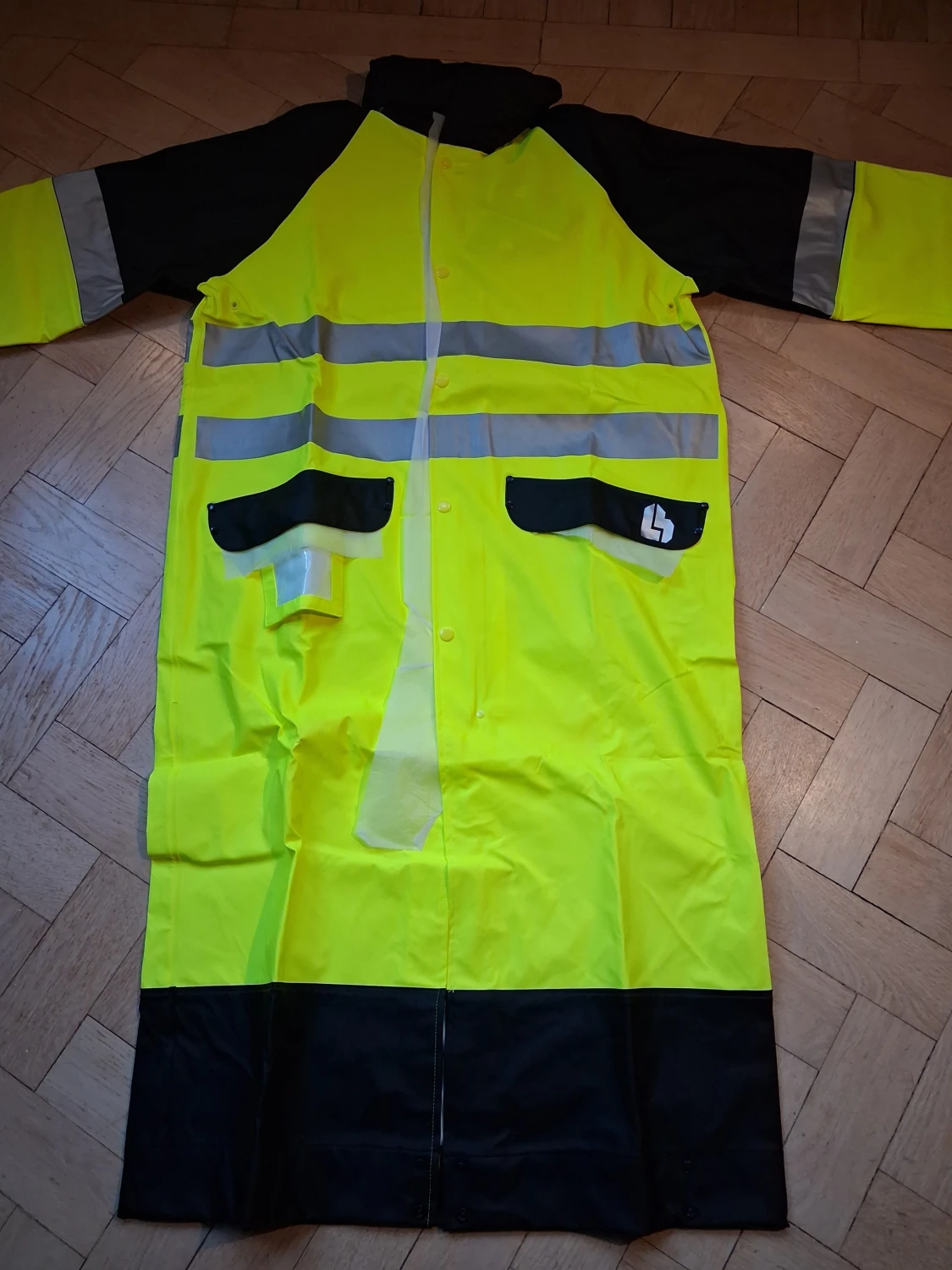 Gul och svart regnjacka med reflex - 1