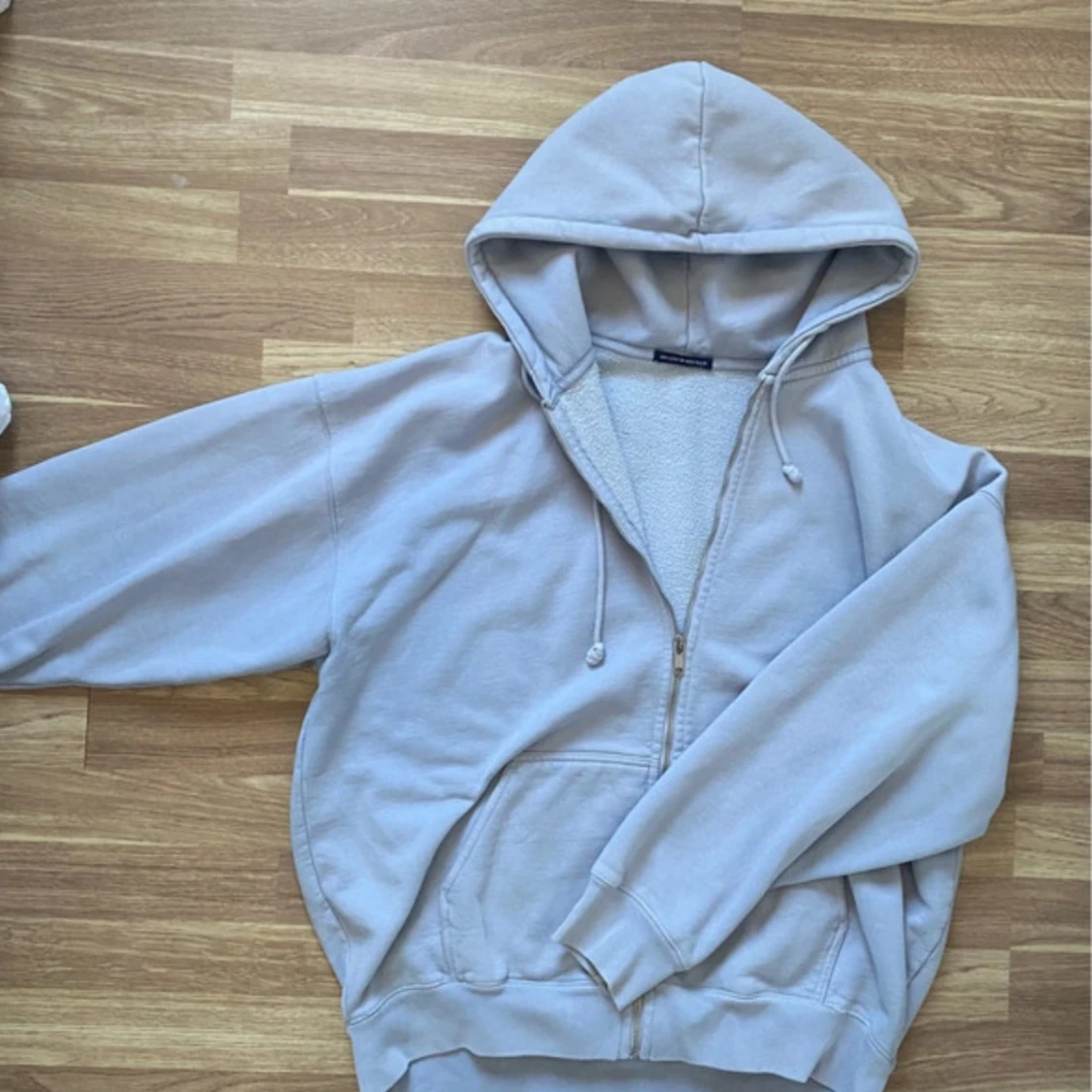 Ljusblå hoodie från Brandy Melville