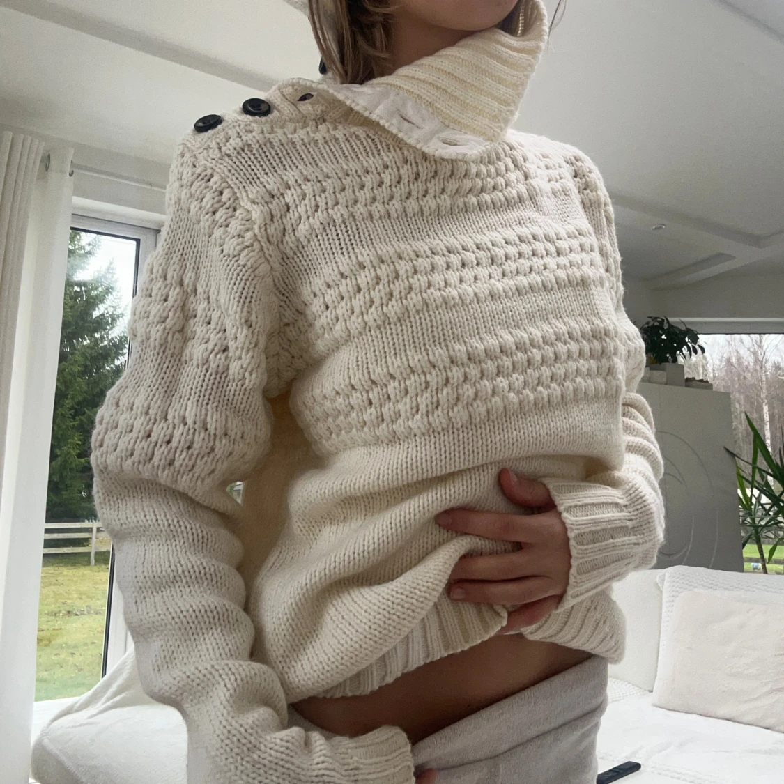 Stickad tröja med polokrage