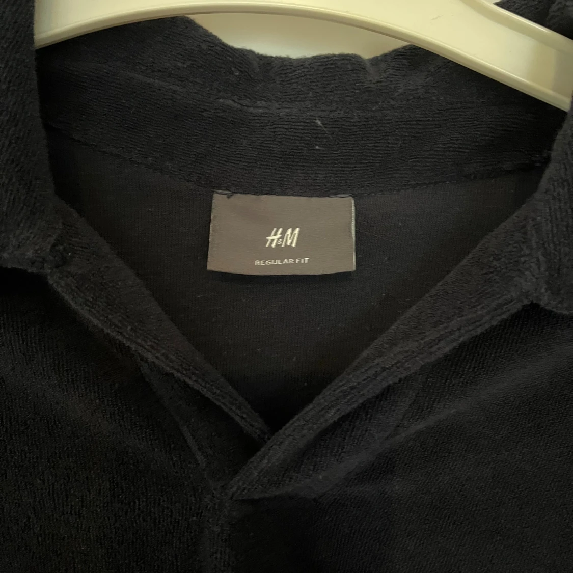 Svart pikétröja i frotté från H&M - 2