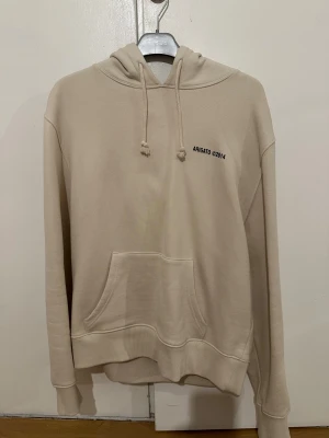 Beige hoodie från Arigato - Säljer en beige hoodie från Arigato 