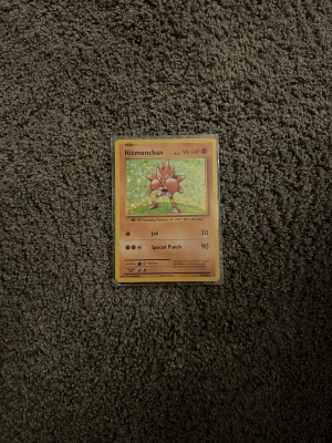 Hitmonchan Pokémonkort - 2016 hitmonchan, vid hög PSA kan gå för mycket, annars bra till samling. Holo, sleeved.