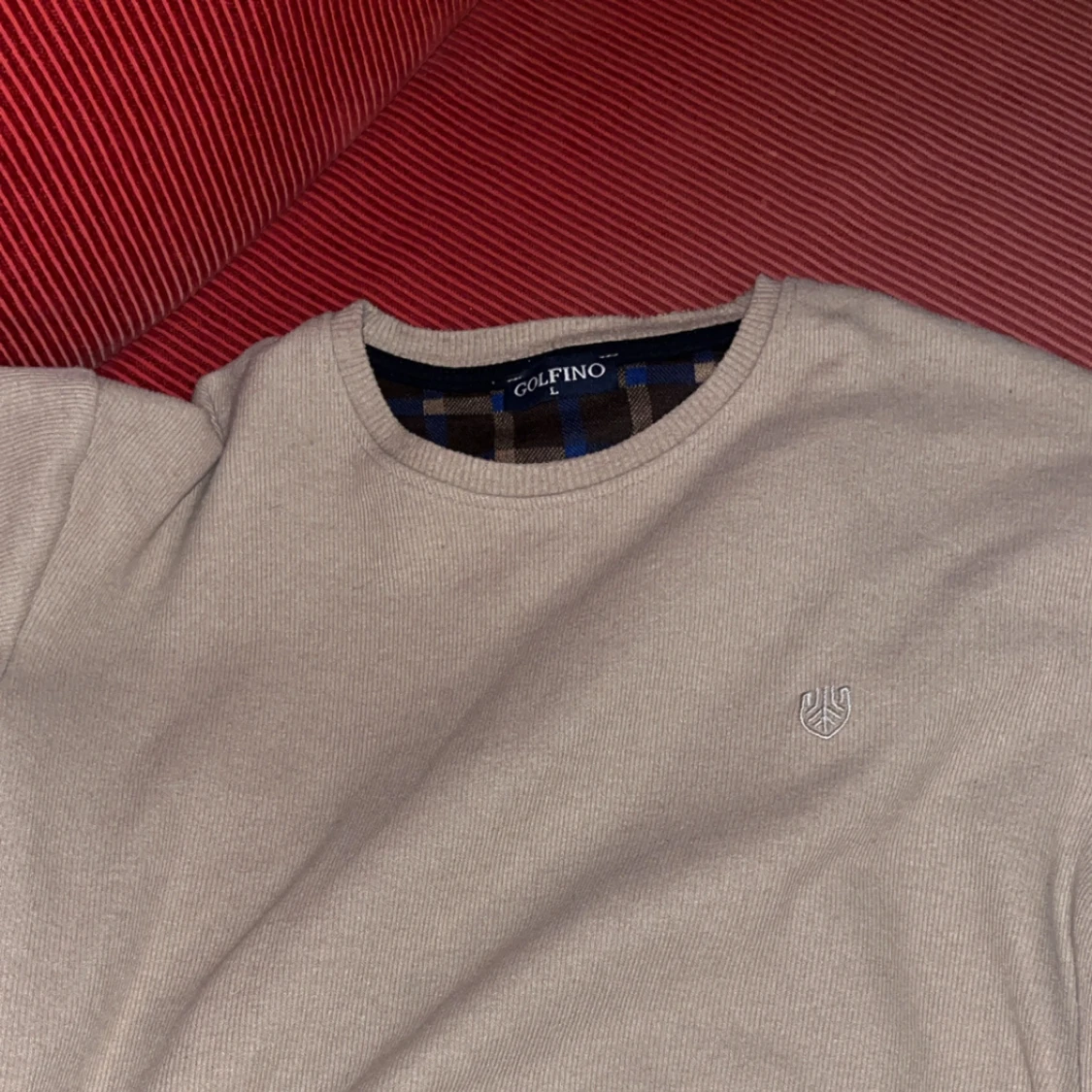 Beige stickad tröja från Golfino