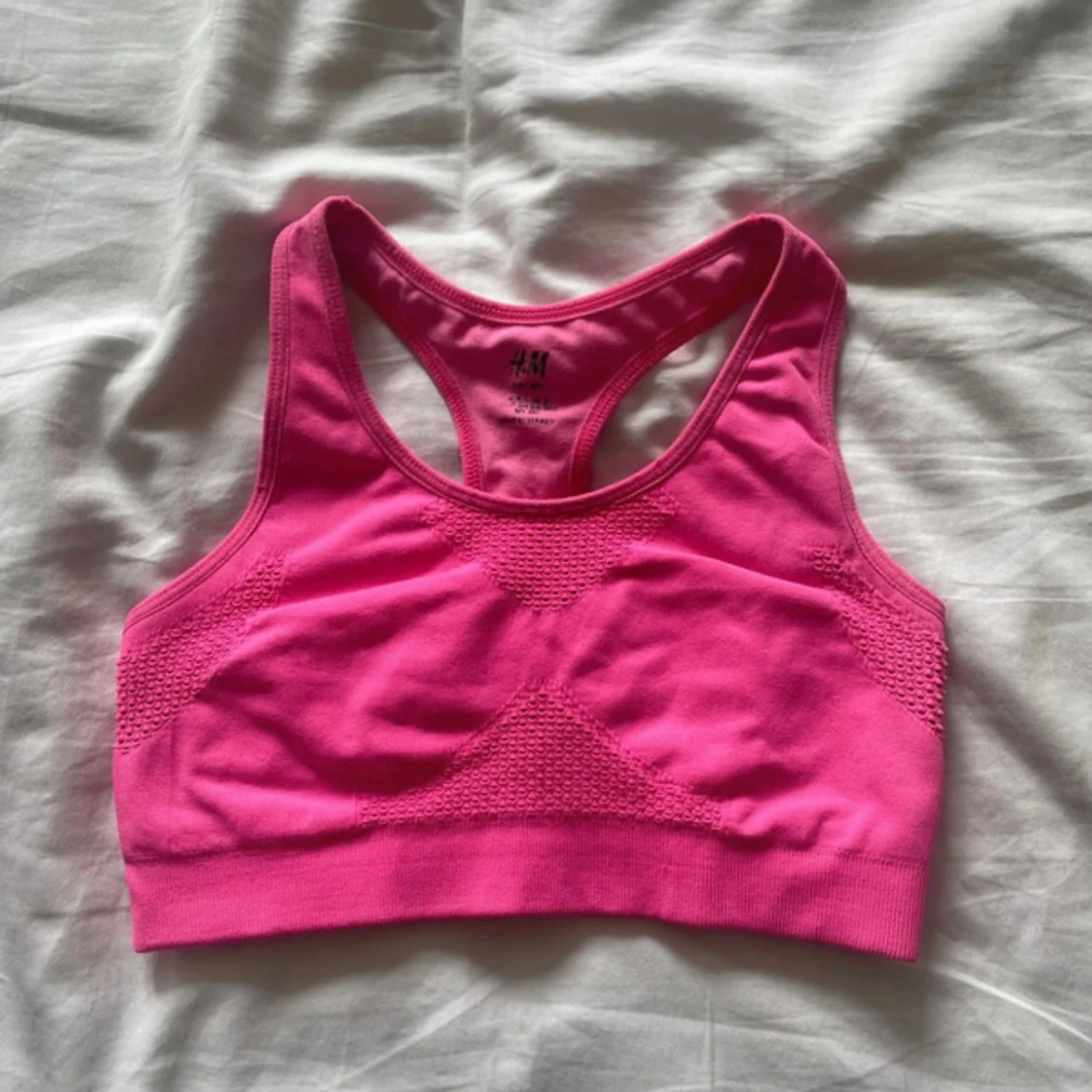 Rosa sportig linnetopp från H&M