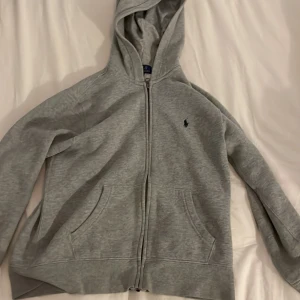 POLO RALPH LAUREN HOODIE (grey) - Not used that much. Looks brand new. It was just too small on me. Send me a message if you are interested and we can discuss the price.