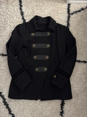 Avant garde asymmetrical double breasted coat - NOT SAINT LAURENT!  Super beautiful unisex coat in perfect condition. Unfortunately no tag or brand or nothing so in guessing it’s a sample for something but either way super cool.  Measurements are:  Length:70cm Width(pit to pit) 44cm
