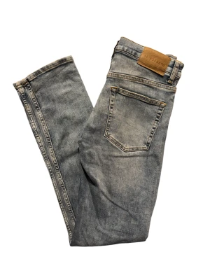 J.Lindeberg Slim fit jeans - Ljusblåa Slim fit jeans från J.Lindeberg i utmärkt skick. Använda endast 1-2 gånger