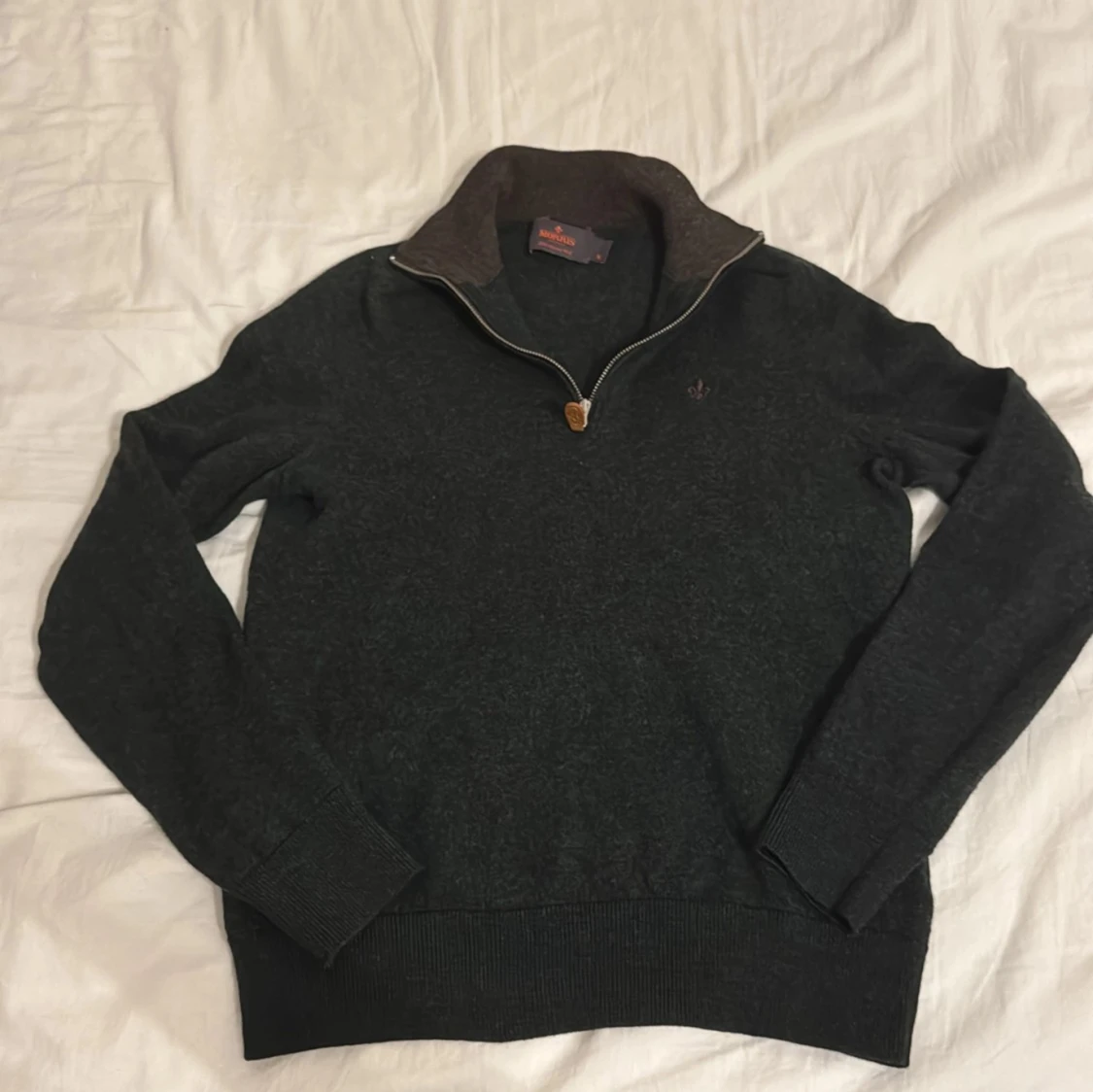 Mörkgrön merinoullströja från Morris