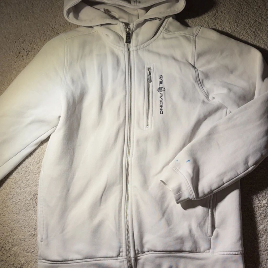 Vit hoodie från Sail Racing med dragkedja