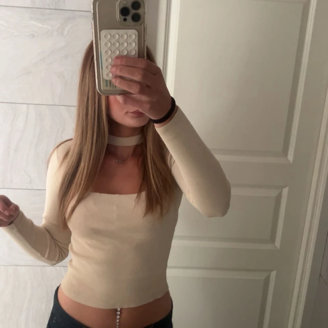 Beige ribbad långärmad topp