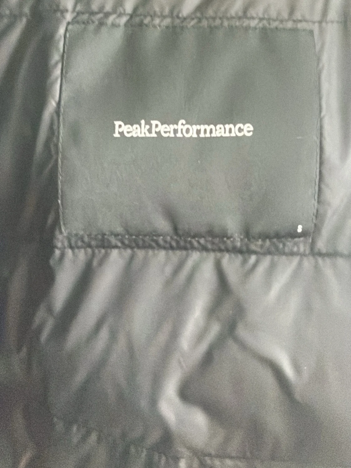 Svart pufferjacka Peak Performance S - 1