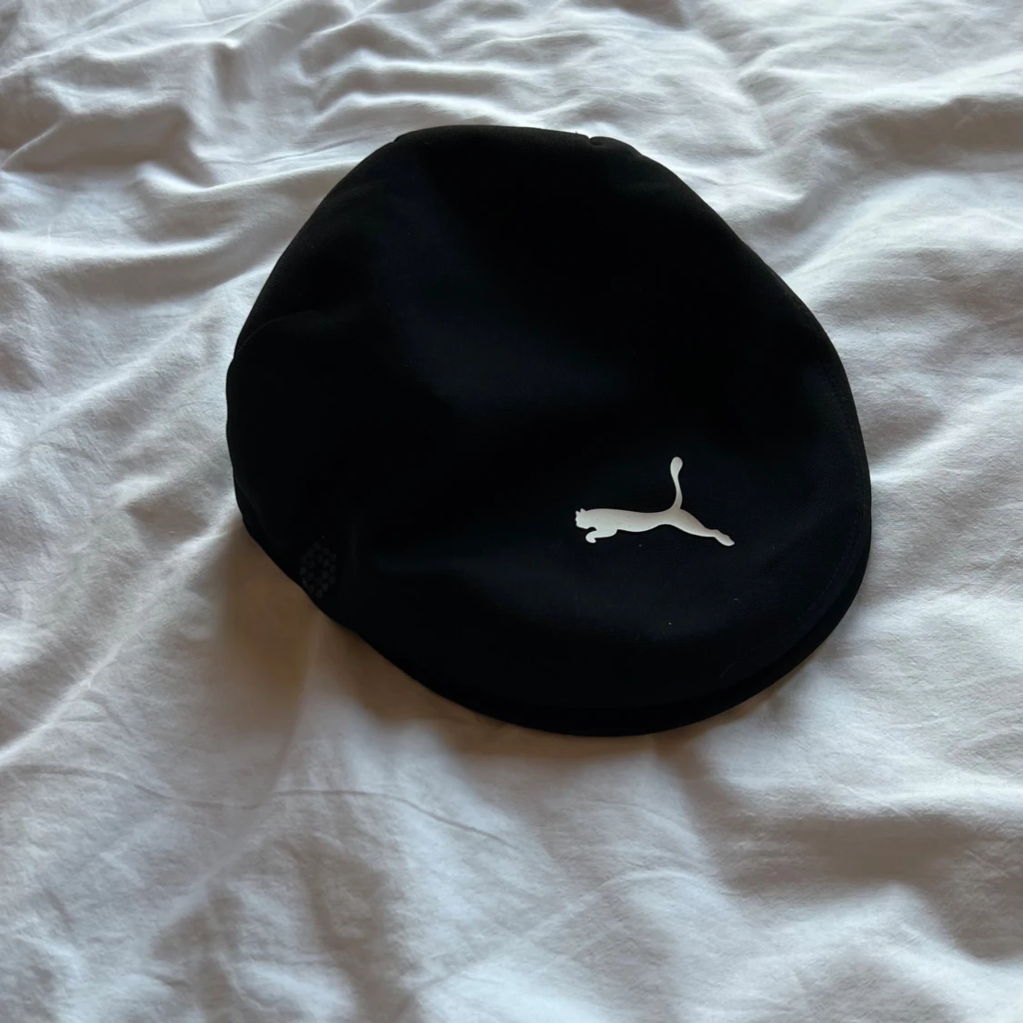 Svart keps från Puma x Cobra