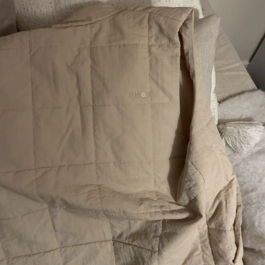 Beige quiltad dunväst från NN07 - 2