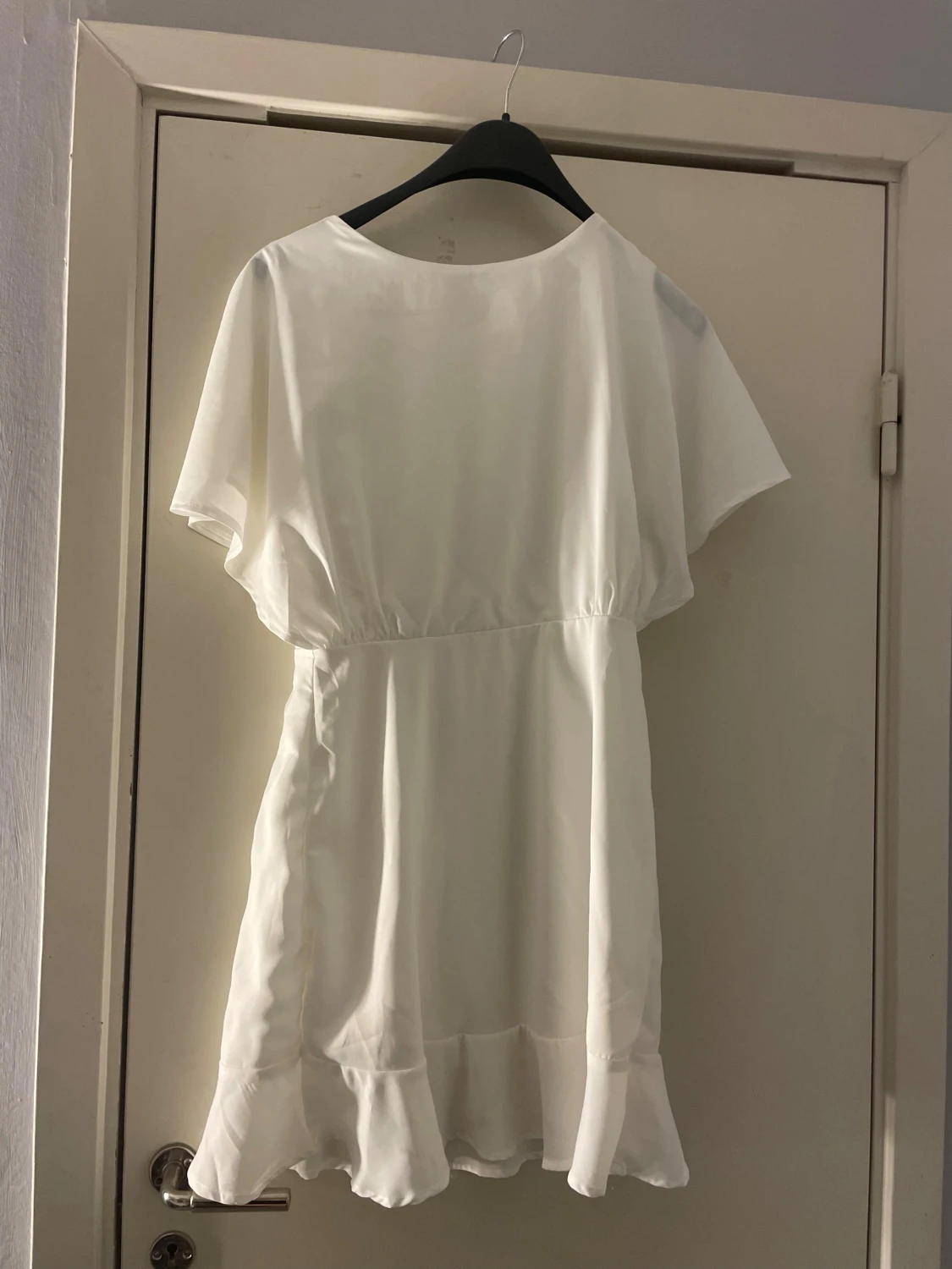 Vit stilren klänning