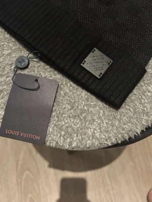 LV mössa svart - LV mössa svart kom privat för mer info samt bilder