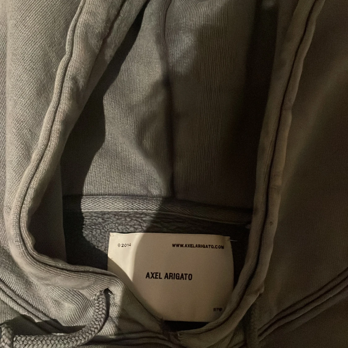 Grå hoodie från Axel Arigato limited edition - 1