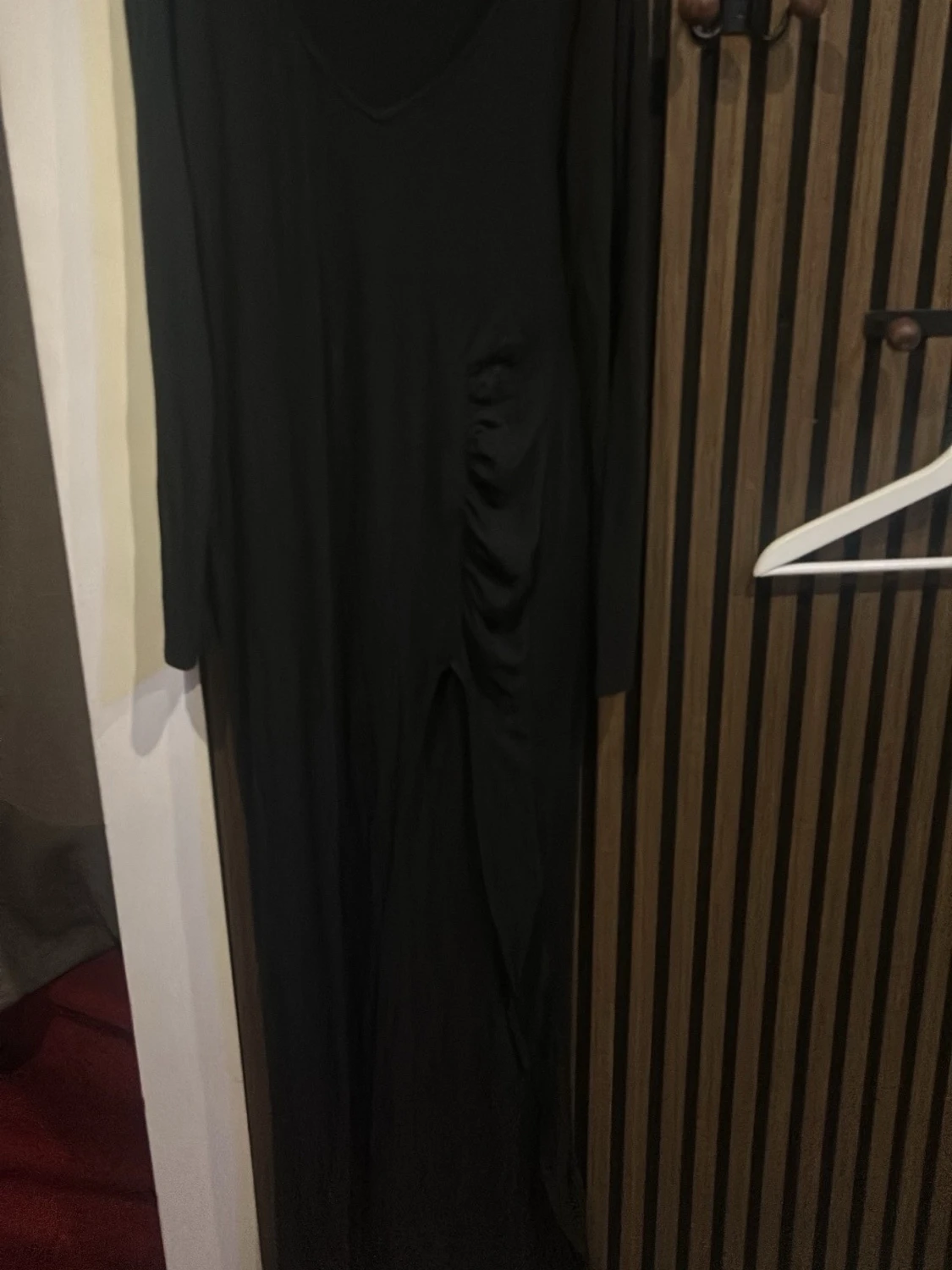 Svart långärmad klänning med rynk