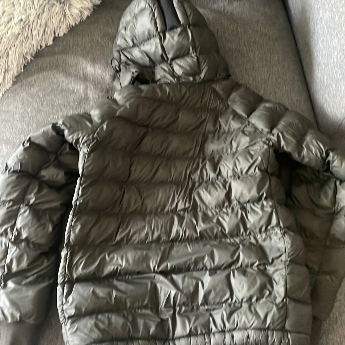 Mörkgrön dunjacka Peak Performance (160) - 1