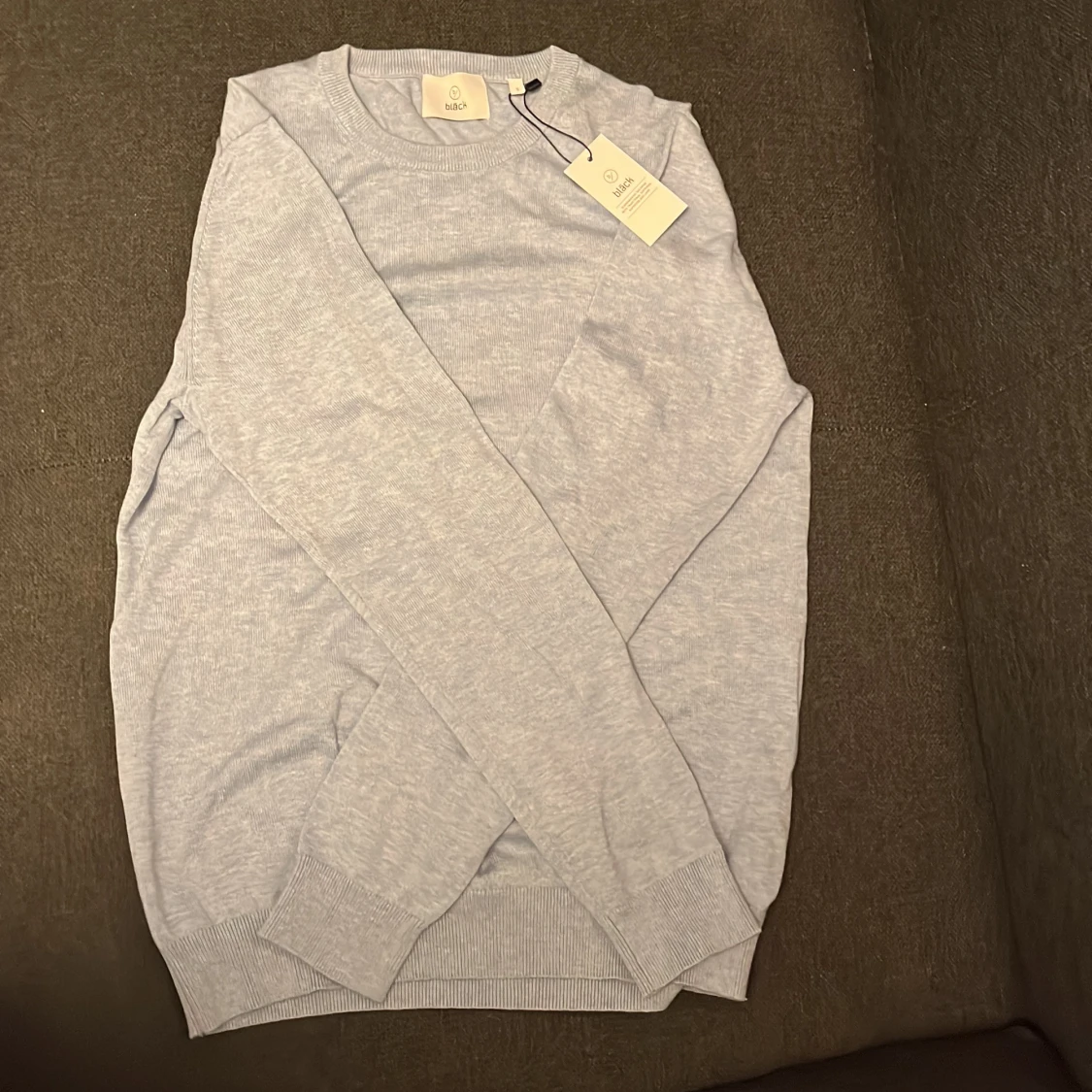 Ljusblå stickad tröja 