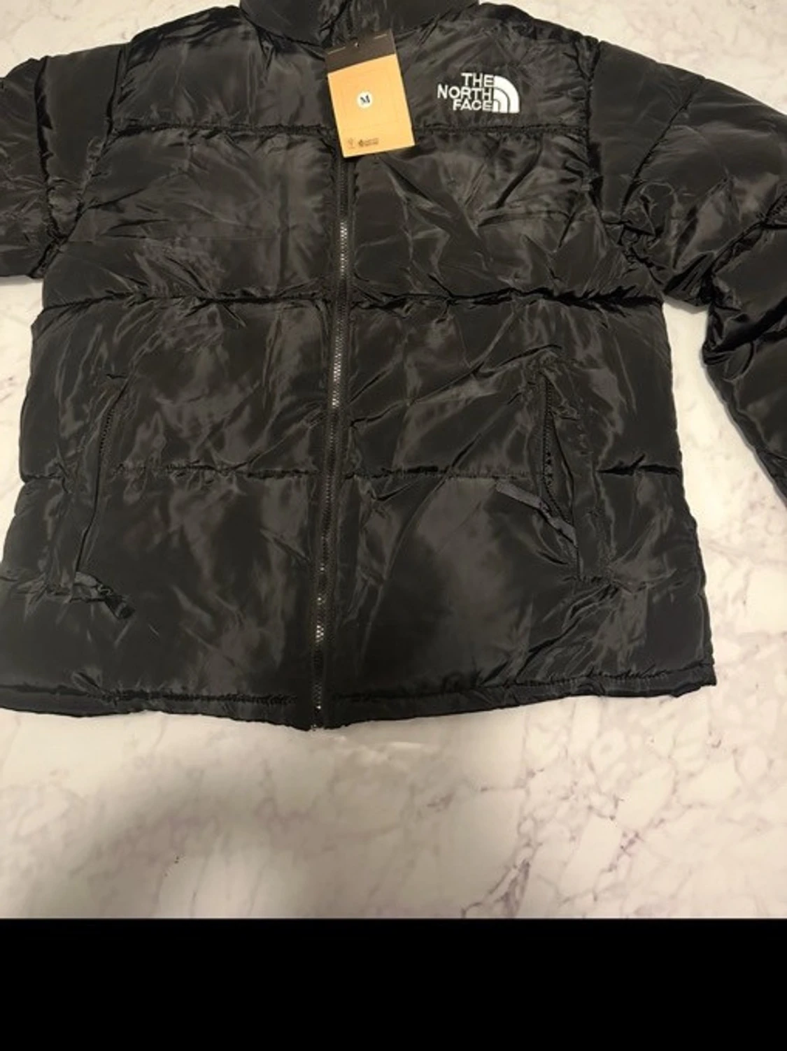 Svart pufferjacka från The North Face - 2