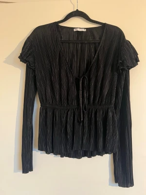 Blus/tröja  - Helt ny aldrig använd. 