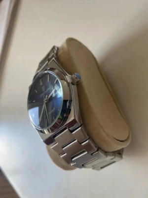 Poedagar herrklocka 41mm kvartz blå urtavla - Säljer en herrklocka med blå urtavla i nytt skick.